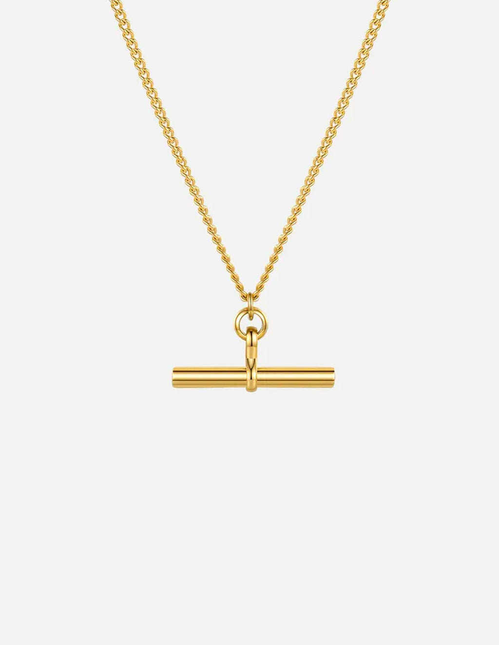 Gold necklace with a bar pendant on a white background