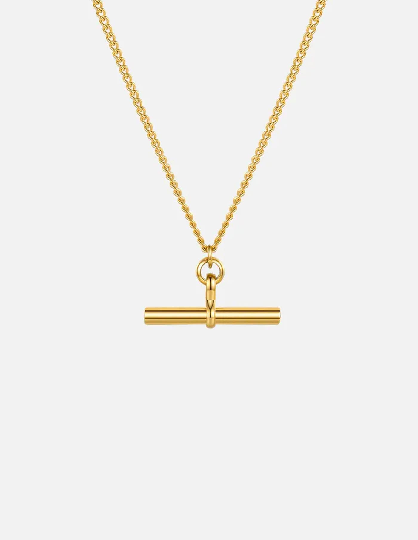 Gold necklace with a bar pendant on a white background