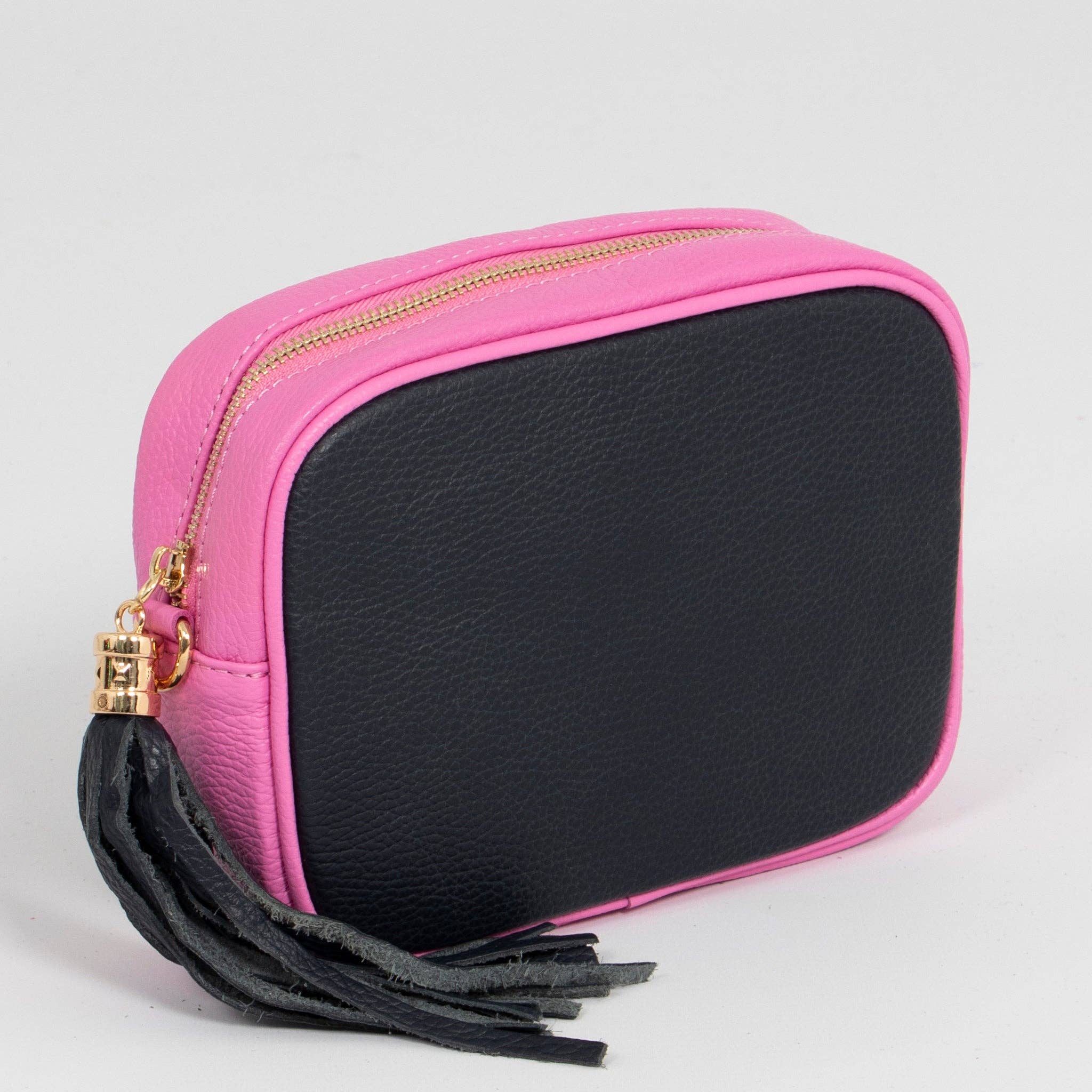 pink and navy crossbody bag with tassel